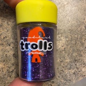 EXPIRED Mac cosmetics collar with the Trolls. A beautiful purple highlighter
